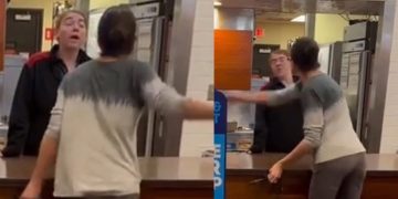 Two people arguing at a restaurant counter.