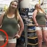 Woman shopping in store wearing casual outfit.