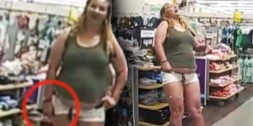 Woman shopping in store wearing casual outfit.