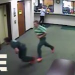 Two people running in front of reception desk