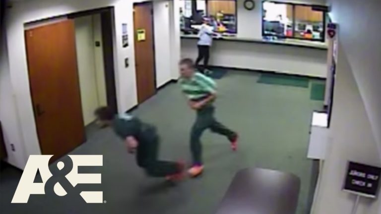 Two people running in front of reception desk