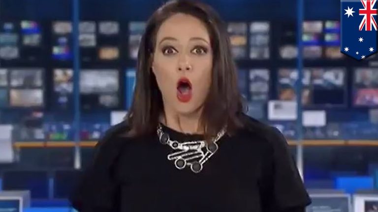 Surprised news anchor in broadcast studio