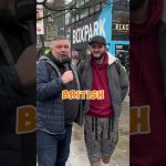 Two men smiling outside Boxpark Camden.