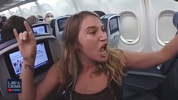 Woman angrily gesturing on airplane.