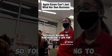 Masked employee confronting customer in store