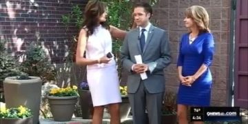 Three news anchors standing outside on 9NEWS set.