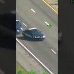 Aerial view of police car on highway