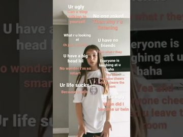 Girl surrounded by negative comments in various colors.