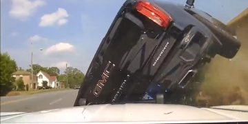 SUV flipping in a crash on road