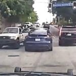 Traffic jam at intersection with three cars