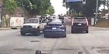 Traffic jam at intersection with three cars