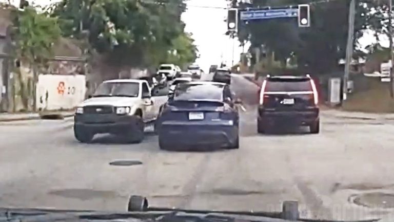 Traffic jam at intersection with three cars