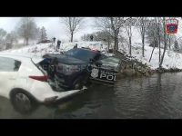 Car crash into river with police vehicle