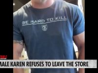 Man in store with 'Be Hard To Kill' shirt.