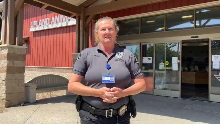 Animal control officer at Upland Animal Services entrance.