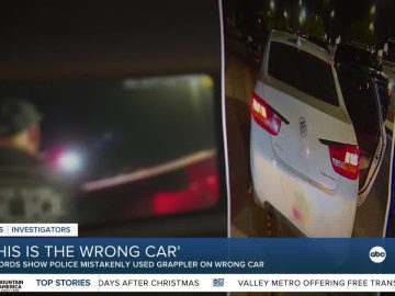 Police mistakenly use grappler on wrong car.