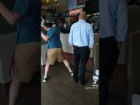 Fast food restaurant confrontation between two men.