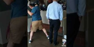 Fast food restaurant confrontation between two men.