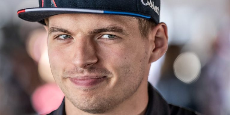 Man wearing a baseball cap, close-up portrait.