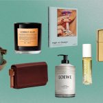 Assorted luxury items against green background