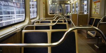 Empty urban train interior with seating