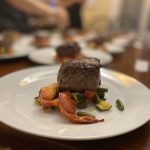 Grilled steak with mixed vegetables on plate